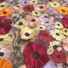 Multicolor Floral Applique Work on Light Pink Net Fabric
