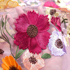 Multicolor Floral Applique Work on Pink Net Fabric