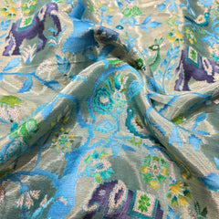Pure Banarasi Silk Brocade with Animal and Nature Motifs on Sky Blue Base