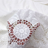 Off-White Cotton Fabric with Floral Cutwork Border