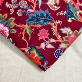 Digitally Printed Maroon Cotton Fabric with Contrast Floral Design