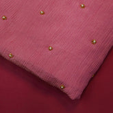 Crushed Tissue Two Tone Fabric with Pearl and Cutdana Work on Salmon Pink Base