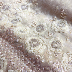 Hand Embroidered Dyeable Shimmer Tissue Fabric with all over Butta and Heavy Border