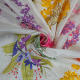 Mridu Digitally Printed Modal Satin Fabric on White Base with multicolored floral patterns