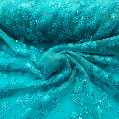 Embroidered Teal Blue Net Fabric with Floral Motifs