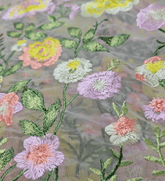 Floral Embroidered Net Fabric in Shades of Yellow, Peach and Light Pink