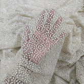 Embroidered Off-white Color Net Fabric with Intricate Floral patterns