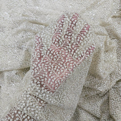 Embroidered Off-white Color Net Fabric with Intricate Floral patterns