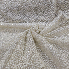 Embroidered Off-white Color Net Fabric with Intricate Floral patterns