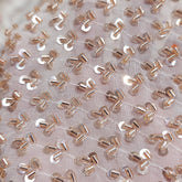 Embroidered Dyeable Georgette Fabric with all over Rose Gold Cutdana Work