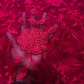 Embroidered Fuschia Pink Net Fabric with all over Floral Pattern