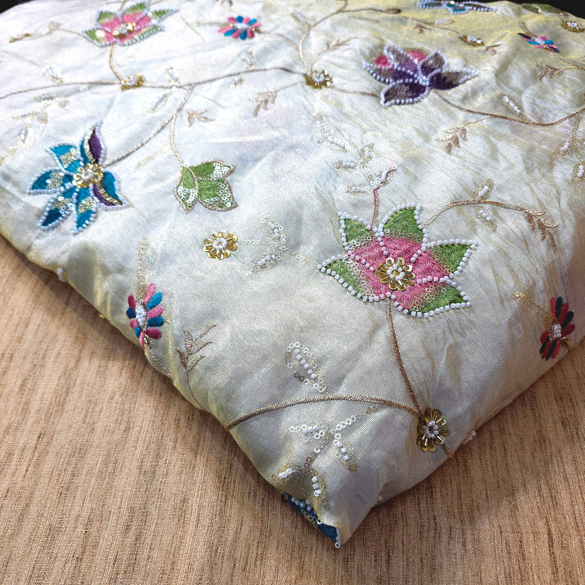 Embroidered Dyeable Shimmer Tissue Fabric with Bright Multicolor Floral Threadwork