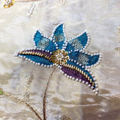 Embroidered Dyeable Shimmer Tissue Fabric with Bright Multicolor Floral Threadwork