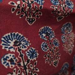 Elegant Handblock Ajrakh Print on Pure Modal Fabric – Indigo Blue & Black Floral Motifs on Maroon Base
