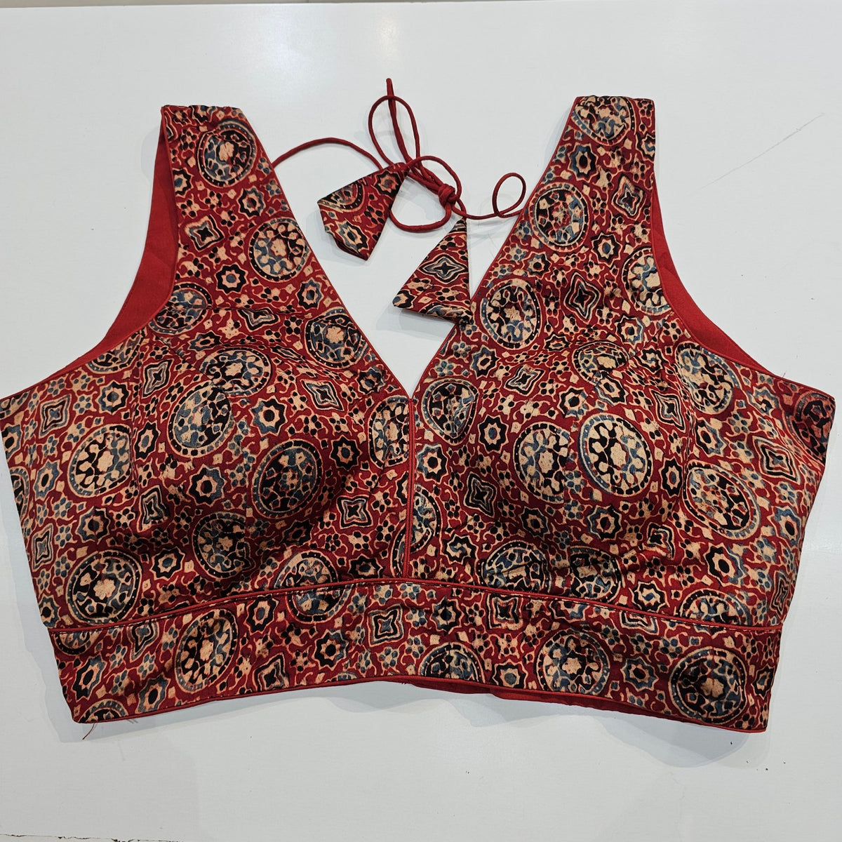 Ajarakh Print on Maroon Modal Silk Blouse with Attached Sleeves and V Shape Neckline