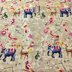 Pure Banarasi Silk Brocade with Animal and Nature Motifs on Golden Base