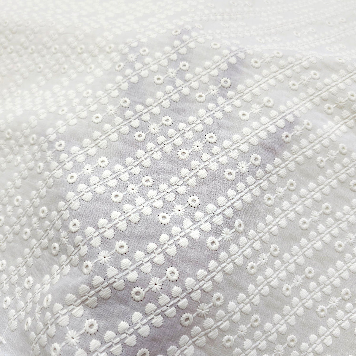 Off-White Color Chikankari Cotton Fabric with Diagonal Design