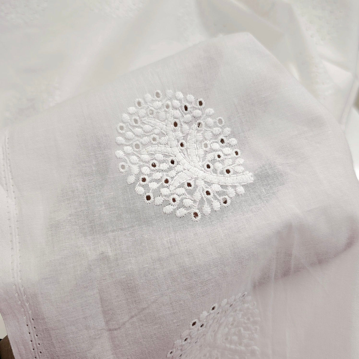 White Cotton Fabric with all over Floral Butta Work