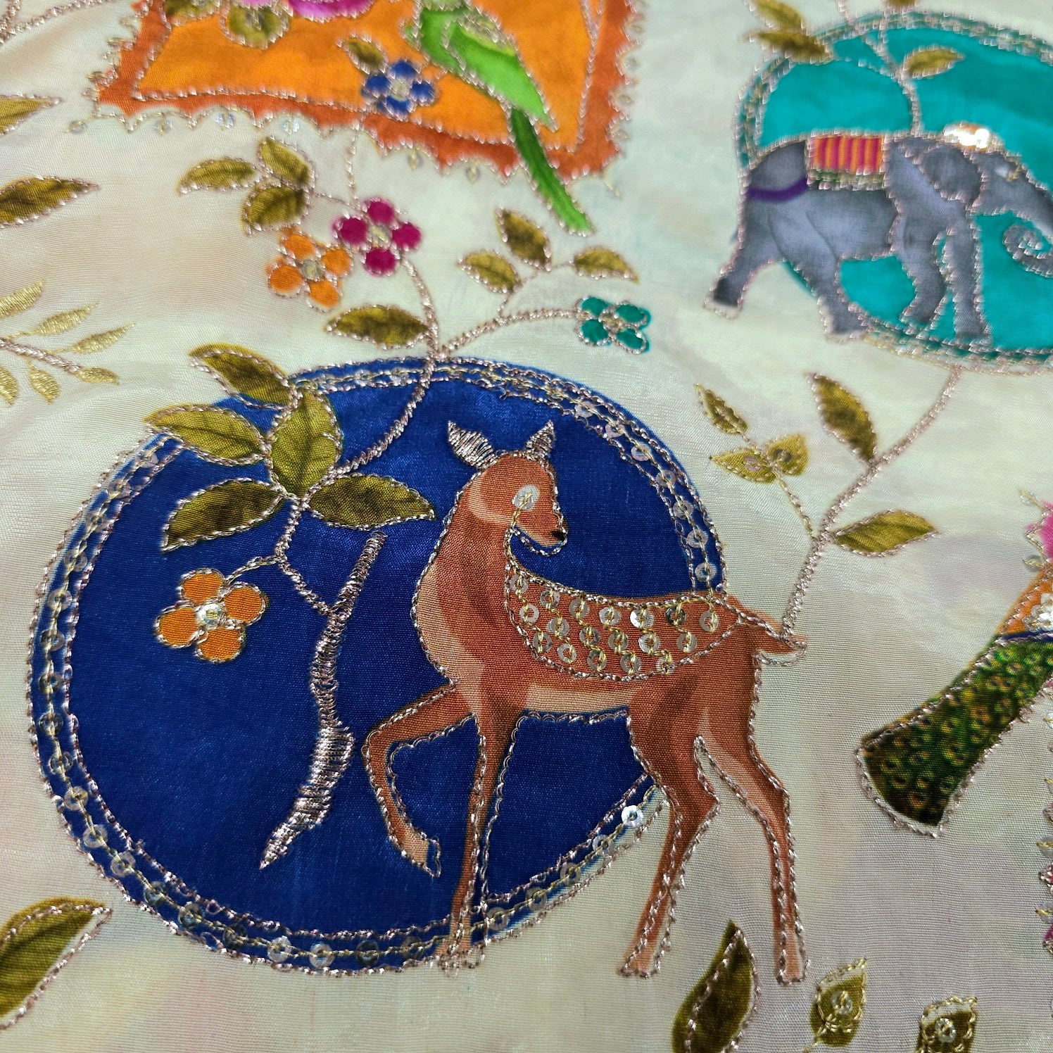 Tarkashi Off  White Base Crepe with Multicolor Animal & Floral Embroidered Motifs