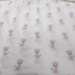 Dyeable Embroidered Raw Silk fabric with Floral Zari work and Sequin Highlights