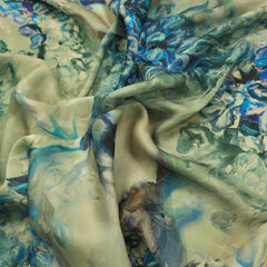 Mridu Digitally Printed Modal Satin Fabric on Pale Mint Green Base with blue floral patterns