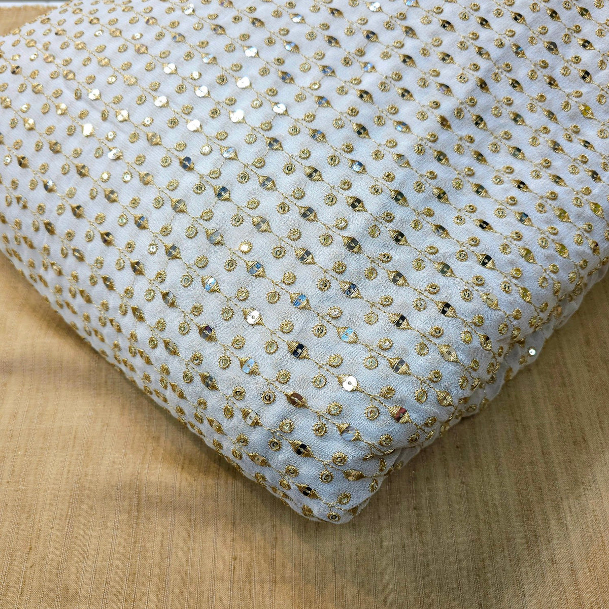 Dyeable Embroidered Georgette Fabric with Eye shaped mirror motifs