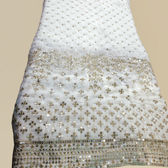 Dyeable Embroidered Georgette Fabric with Mirror Work and Heavy Border in Daman