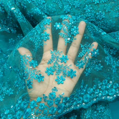 Embroidered Teal Blue Net Fabric with Floral Motifs