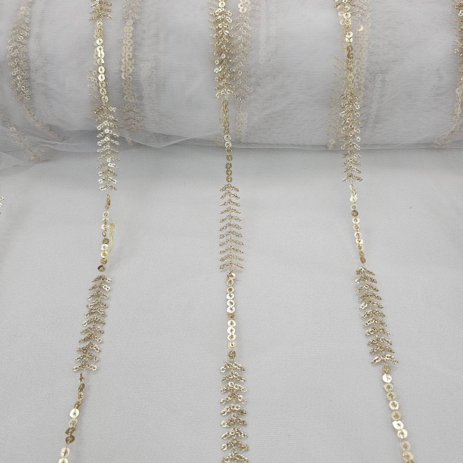 Rahat Gold Sequin & Zari Linear Embroidered Dyeable Net Fabric