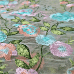 Floral Embroidered Net Fabric in Shades of Baby Pink, Peach & Acqa