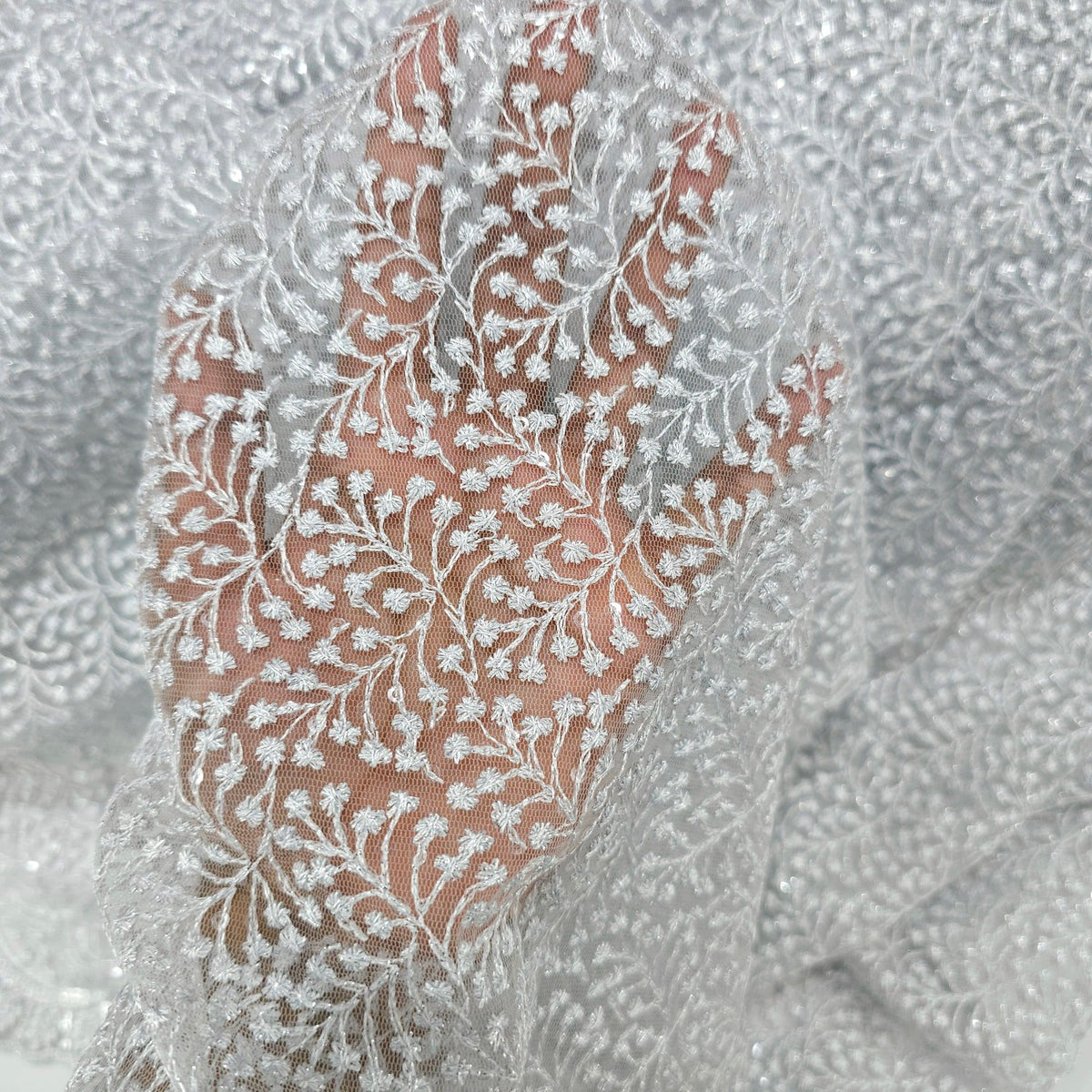 Embroidered Light Grey Color Net Fabric with Intricate Floral patterns