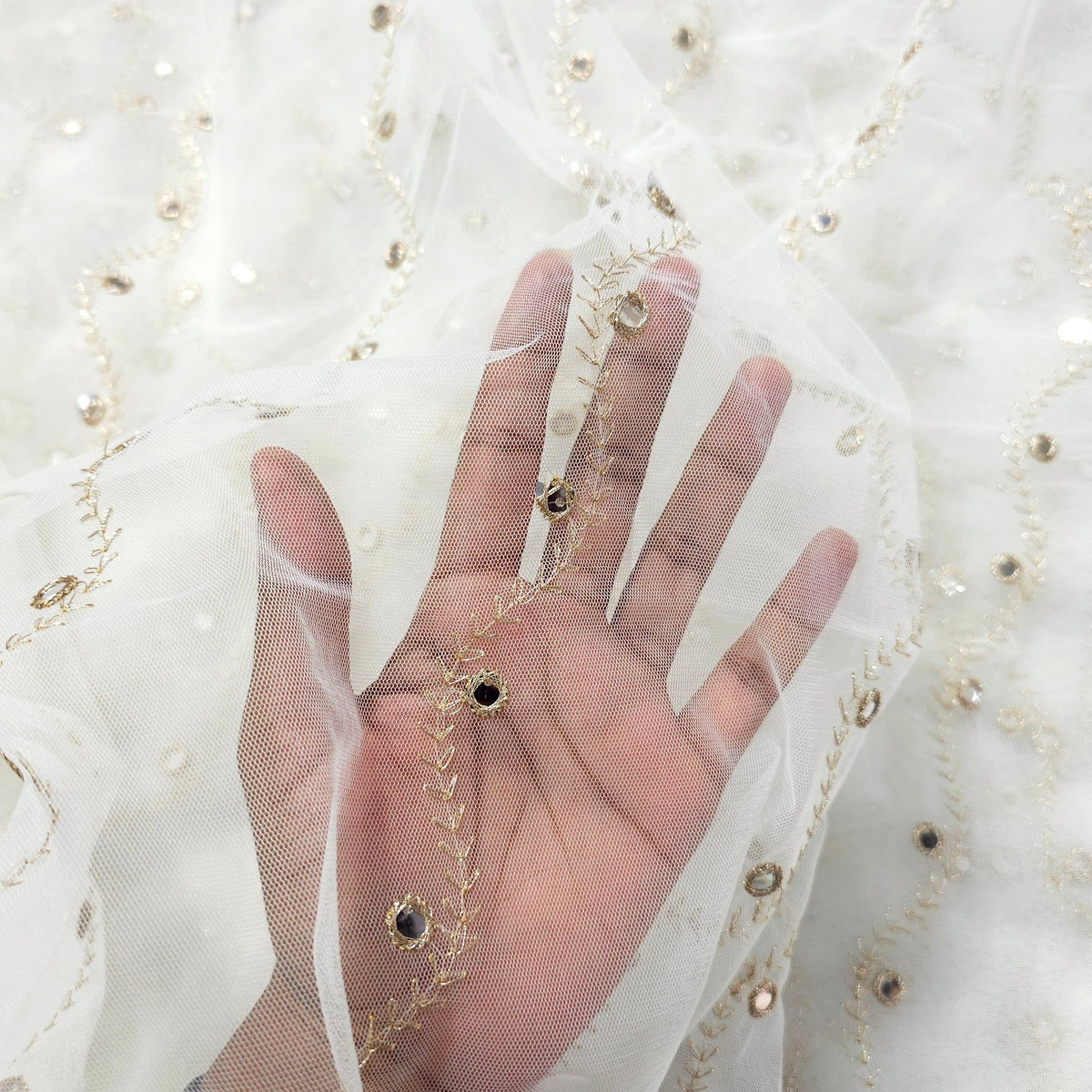 Dyeable Net Fabric with Mirror Highlights & Zari Work in Wavy Pattern