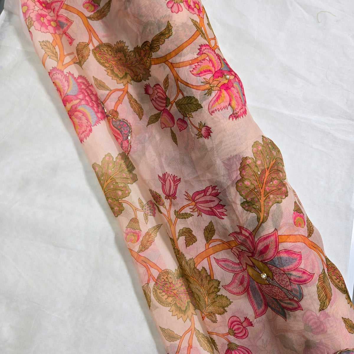 Multi-color Floral Digital Print on Peach Organza Fabric with Handwork
