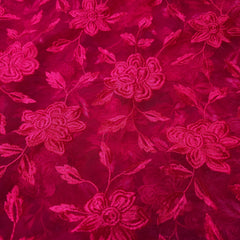 Embroidered Fuschia Pink Net Fabric with all over Floral Pattern