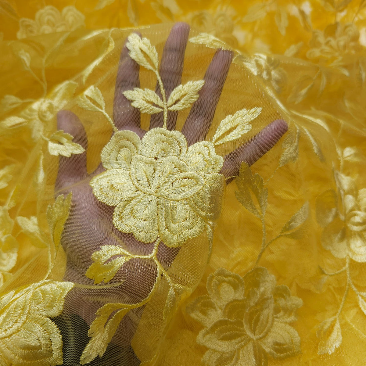Embroidered Lemon Yellow Net Fabric with all over Floral Pattern