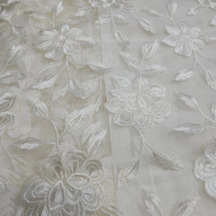 Embroidered White Net Fabric with all over Floral Pattern