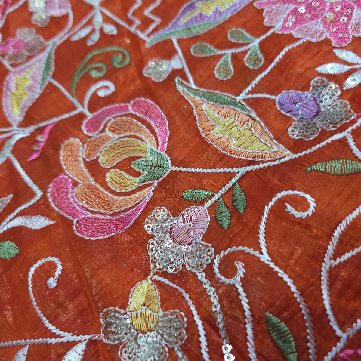 Multi-color Floral Resham work on Orange Soft Organza with Sequin Highlights