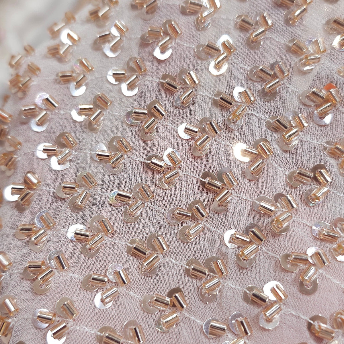 Embroidered Dyeable Georgette Fabric with all over Rose Gold Cutdana Work