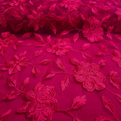 Embroidered Fuschia Pink Net Fabric with all over Floral Pattern
