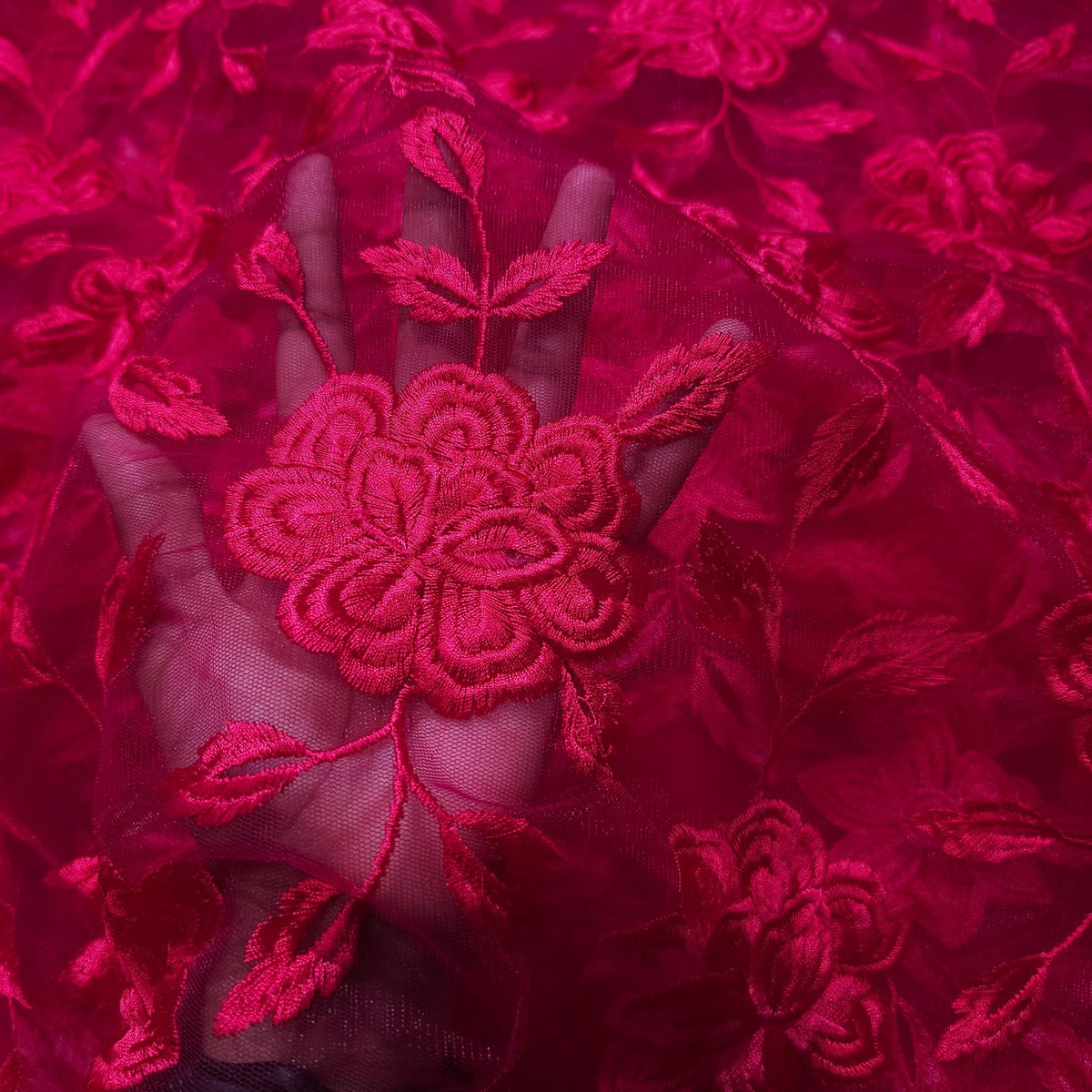 Embroidered Fuschia Pink Net Fabric with all over Floral Pattern